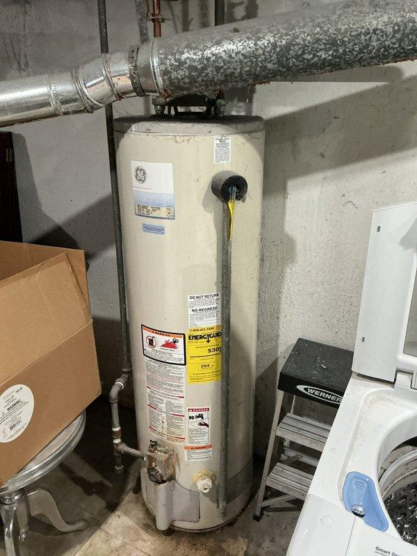 Responded to service call for dripping bathtub faucet. Upon arrival, performed diagnostic assessment of the affected fixture to identify source of constant drip. Inspected mechanical room and utility areas to evaluate overall plumbing system condition and accessibility. Provided professional consultation regarding drain snaking services as requested by homeowner, including detailed pricing information for potential future work. Documented existing conditions of water heater, HVAC systems, and associated plumbing infrastructure through photographic records for service file.