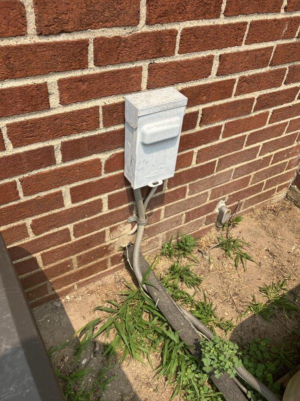 Conducted comprehensive site evaluation for complete HVAC system replacement at residential property. Assessed existing outdoor condensing unit positioned on concrete pad against brick exterior wall, along with associated electrical disconnect box and control components. Documented current equipment configuration, electrical infrastructure including junction box and conduit routing, and available installation space for new system components. Provided detailed sales estimate for full system replacement including new condensing unit, air handler, and all necessary electrical connections and controls to meet customer's requirements for brand new HVAC equipment installation.