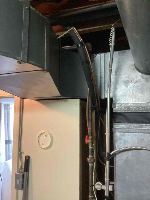 Conducted comprehensive estimate for complete HVAC system replacement of 30-year-old equipment. Assessed existing Goodman furnace unit located in basement utility area along with outdoor air conditioning condenser positioned in backyard. Documented current system configuration including metallic ductwork, gas line connections with shutoff valve, flexible duct connections, and copper refrigerant lines. Evaluated air handler components, supply and return duct infrastructure, and existing electrical and gas utility connections. Photographed equipment specifications, model information, and installation setup to determine proper sizing and compatibility requirements for new system. Provided recommendations for modern high-efficiency replacement equipment to improve performance and energy consumption.