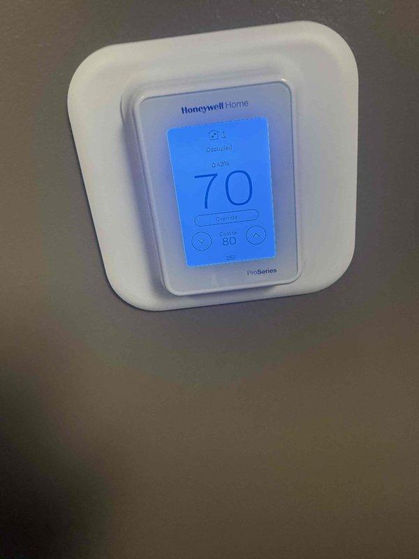 Completed scheduled maintenance on four rooftop units at commercial facility. Performed routine inspections, filter replacements, and system checks on all RTU equipment as part of maintenance agreement. Verified thermostat operation and documented equipment conditions with photos showing electrical components and control systems functioning properly.