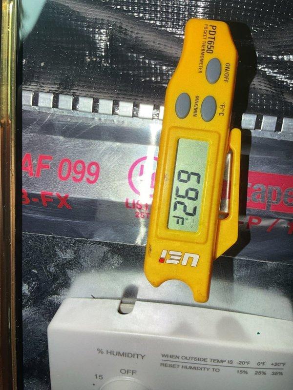 Responded to no cooling complaint on dual-zone residential system with one non-operational unit affecting half the residence. Diagnosed blown 25-amp fuse on outdoor Lennox condenser unit, replaced fuse and restored cooling operation. Verified proper temperature differential at supply ductwork reading 52°F and confirmed both indoor and outdoor units returned to normal operation with adequate airflow and refrigerant cycle.