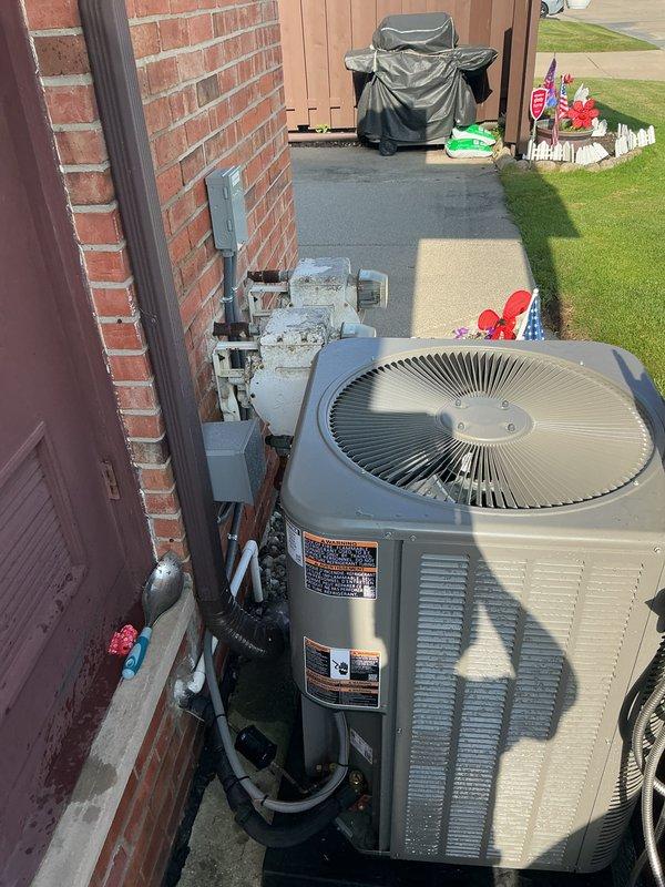 Completed comprehensive AC tune-up and maintenance inspection on one-year-old residential air conditioning system. Performed standard preventive maintenance procedures including visual inspection of outdoor condenser unit, verification of electrical connections and disconnect box, examination of refrigerant lines and insulation integrity, and assessment of interior components including control board, wiring, capacitor, and air filter condition. All system components found operating within normal parameters with no deficiencies noted at time of service.