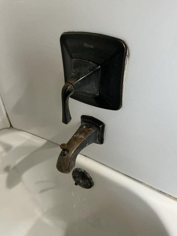 Responded to bathroom shower faucet malfunction where the handle was continuously spinning without controlling water flow or shutting off the water supply. Diagnosed failed shower cartridge in the Pfister shower valve assembly. Replaced defective cartridge, restoring proper operation of the temperature control handle and water shut-off functionality.