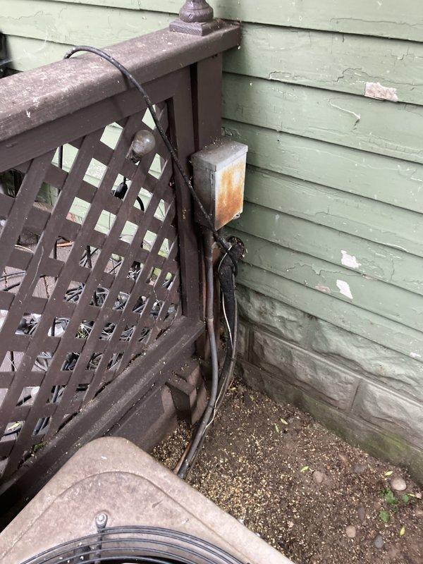 Responded to emergency no-cooling call for elderly homeowner during high temperature conditions. Evaluated 10+ year old Bryant air conditioning system located at residence with condenser unit positioned on exterior concrete pad adjacent to perimeter fencing. Unit exhibited significant age-related deterioration including weathered cabinet surfaces, dirt accumulation, and overall wear consistent with decade-plus outdoor exposure. Conducted comprehensive system assessment and provided full HVAC system replacement estimate including both furnace and air conditioning equipment to address failed cooling system and aging infrastructure.