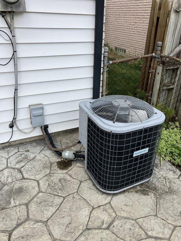 Responded to service call for residential air conditioning system not cooling with blower operational. Inspected 10-year-old outdoor condenser unit located at rear of property and evaluated indoor air handler components. Unit showed signs of age-related wear consistent with expected service life. Documented existing system configuration including refrigerant line routing, electrical disconnect, and conduit connections to structure. Assessed electrical panel capacity and current HVAC circuit installation. Provided comprehensive system replacement estimate covering full HVAC equipment upgrade due to aging equipment and cooling failure.