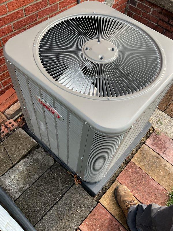 Completed Gold AC inspection on a 2-year-old Lennox air conditioning system with air handler located in basement. Performed comprehensive system evaluation including inspection of outdoor condenser unit, interior air handler with AprilAire control panel, and all accessible components. System is operating properly with no deficiencies noted at time of inspection.