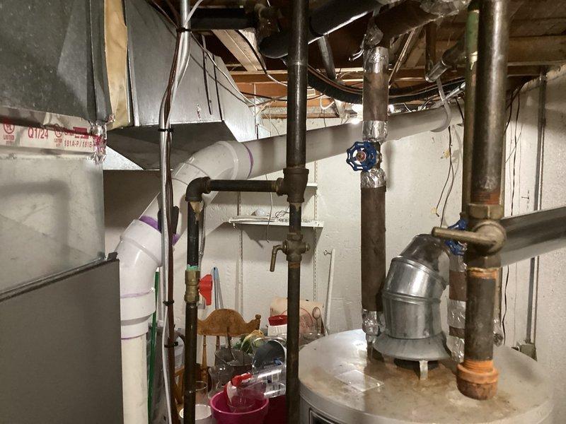 Responded to gas leak call affecting both furnace and water heater in basement mechanical room. Performed comprehensive leak detection inspection on 4-year-old furnace and 10+ year-old water heater, checking all gas supply lines, connections, and fittings using electronic leak detector and soap solution. Identified leak source, tightened gas line connections, and verified proper sealing at all joints. Conducted combustion analysis on both units to ensure safe operation, confirmed proper venting, and tested all safety controls. Re-pressurized gas lines and performed final leak check to verify complete resolution. All equipment returned to safe operating condition with no detectable leaks present upon completion.