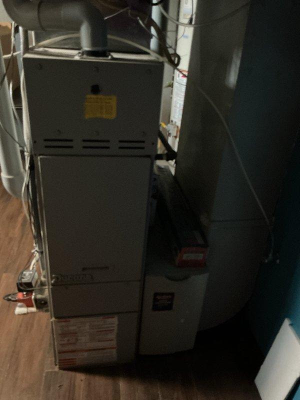 Performed furnace inspection on 16-year-old heating system located in basement of vacant residential property. During diagnostic evaluation, discovered cracked heat exchanger, rendering unit unsafe for operation and beyond economical repair. Provided estimate for complete furnace replacement due to critical safety hazard that cannot be remediated through standard repair procedures.