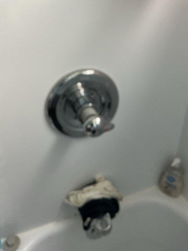 Replaced faulty Owen CS cartridge in shower valve assembly to restore proper water flow and temperature control. Tested operation of tub spout diverter and all chrome fixtures to ensure proper functionality after cartridge installation.