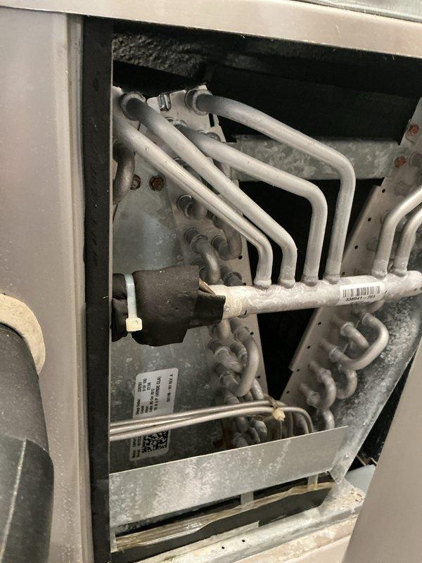 Performed scheduled maintenance on 115kW Honeywell liquid-cooled standby generator, including visual inspection of all accessible components, verification of coolant levels, and operational testing. Conducted preventive maintenance inspection on 10+ year old air conditioning system with air handler located in basement and outdoor condenser unit. Inspected evaporator coil, refrigerant lines, and electrical connections; noted dust accumulation on interior components consistent with normal operation. Advised property owner that condenser area requires clearing of debris and animal waste to maintain proper airflow and system efficiency. All equipment operating within normal parameters at time of service.