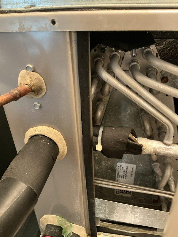 Performed scheduled maintenance on 115kW Honeywell liquid-cooled standby generator, including visual inspection of all accessible components, verification of coolant levels, and operational testing. Conducted preventive maintenance inspection on 10+ year old air conditioning system with air handler located in basement and outdoor condenser unit. Inspected evaporator coil, refrigerant lines, and electrical connections; noted dust accumulation on interior components consistent with normal operation. Advised property owner that condenser area requires clearing of debris and animal waste to maintain proper airflow and system efficiency. All equipment operating within normal parameters at time of service.
