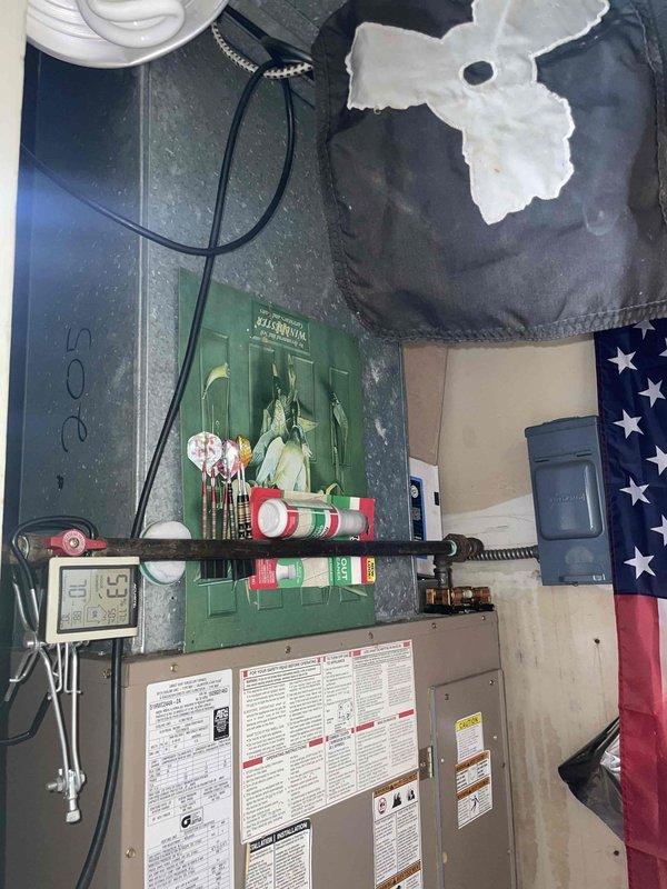 Responded to service call for non-operational air conditioning system at residential property. Unit located on porch, approximately 10+ years old. Conducted comprehensive system evaluation and diagnostic assessment to determine failure cause and provide full system replacement estimate. Documented existing HVAC equipment configuration including furnace and air handler components in mechanical room. Assessed electrical service panel, refrigerant lines, ductwork connections, and overall system infrastructure. Provided detailed findings and replacement recommendations to homeowner, including equipment specifications and installation requirements for complete system upgrade.