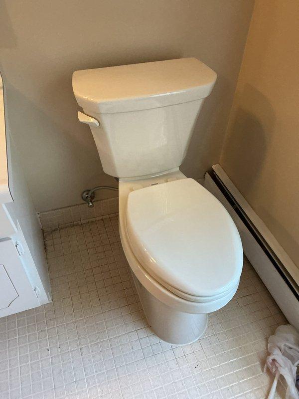 Responded to water leak reported in hallway area. Upon inspection, identified active water intrusion causing significant ceiling damage with brownish staining, discoloration patterns, and compromised drywall with visible breakthrough to substrate. Inspected bathroom plumbing fixtures including toilet and supply lines to isolate leak source. Assessed shut-off valve functionality and checked for visible signs of pipe deterioration or fixture failure. Documented extensive water damage patterns indicating ongoing moisture intrusion requiring further investigation to determine if leak originates from supply lines, drain pipes, or second-floor plumbing above damaged ceiling area. Recommended comprehensive plumbing system evaluation to determine extent of repairs needed versus full system replacement.
