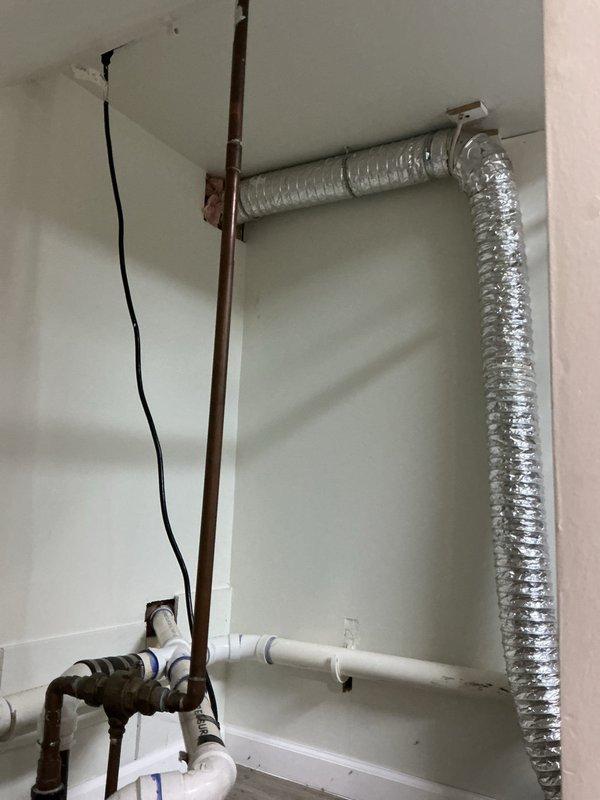 Responded to service call regarding sump pump overflow line malfunction and replacement evaluation. Upon arrival, inspected existing sump pump installation in utility room, including discharge piping configuration and overflow line routing. Assessed PVC discharge pipe assembly and identified issues with overflow line water flow direction. Examined pump basin, check valve operation, and piping connections to determine system deficiencies. Documented existing plumbing infrastructure including copper and PVC pipe configuration, electrical wiring, and pump mounting setup. Provided comprehensive assessment of sump pump system and prepared replacement quote for customer consideration.