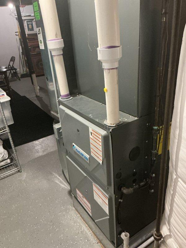 Completed comprehensive Gold AC Inspection on 4-year-old residential HVAC system with air handler and coil located in basement. Performed multi-point inspection of furnace, air handler, Aprilaire humidifier, ductwork, condensate drainage system, and all associated components. All equipment found to be in normal operational condition with no visible defects, leaks, or safety concerns identified during inspection.