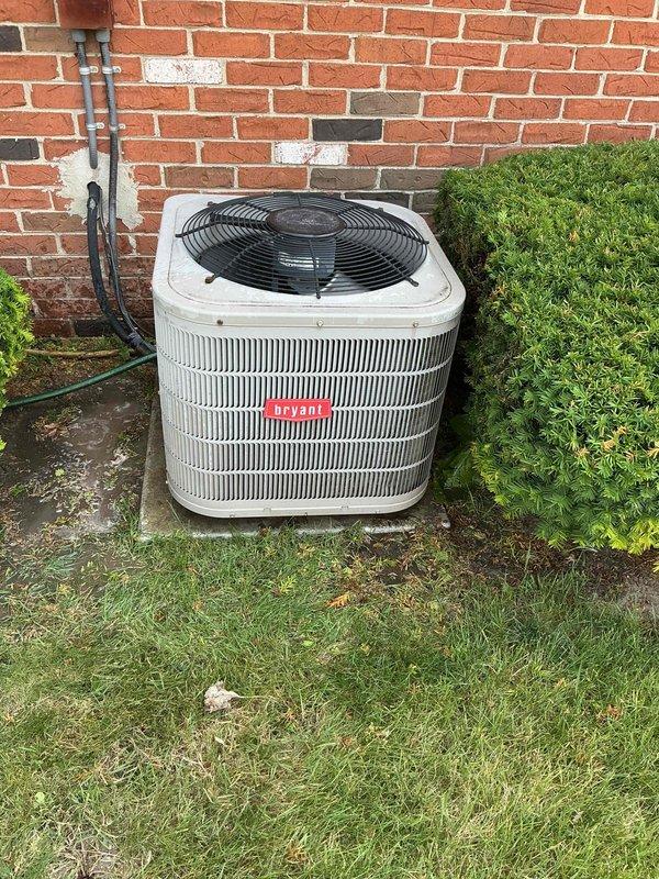 Completed annual maintenance on Bryant outdoor air conditioning condenser unit. Performed comprehensive AC tune-up including inspection of all electrical components, refrigerant lines, and system operation. Documented significant rust and corrosion on capacitor requiring monitoring for potential future replacement. Verified proper operation of condenser fan, checked refrigerant line connections, and ensured unit functionality for the cooling season.