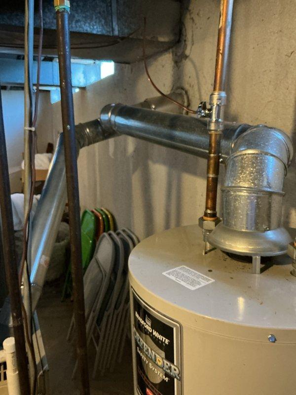 Completed Gold AC inspection and equipment evaluation for 25+ year old HVAC system located in basement. Assessed existing furnace/air handler unit and associated components, documenting current condition of aging equipment showing normal wear patterns and dust accumulation. Evaluated ductwork, PVC condensate drainage system, and overall system configuration. Photographed equipment for replacement estimate documentation. Provided homeowner with comprehensive assessment and replacement recommendations for the aging HVAC system.
