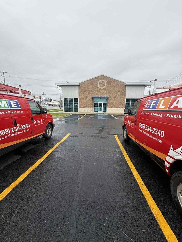 Responded to report of water dripping inside building from rooftop HVAC unit. Inspected commercial air conditioning system and confirmed unit was operating properly with adequate cooling performance. Conducted thorough examination of rooftop unit, refrigerant lines, and drainage components to identify source of interior water leak and documented equipment condition with photographs.