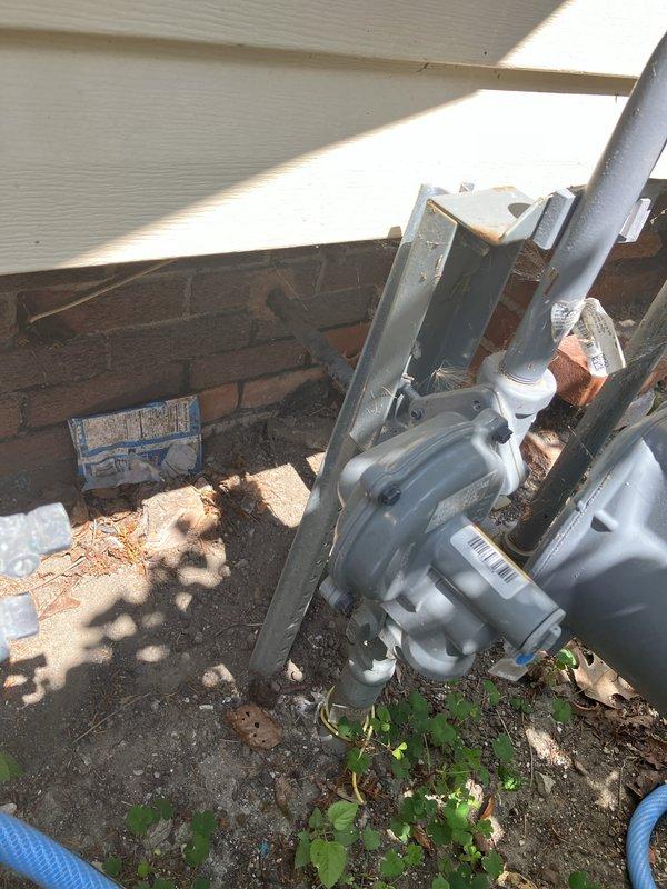 Conducted comprehensive site evaluation for whole home generator installation at residential property. Assessed existing electrical panel configuration, documenting current breaker layout and available capacity for generator integration. Evaluated exterior installation location adjacent to building foundation, noting existing utility meter placement, electrical conduit routing, and available space for generator pad placement and fuel line connections.