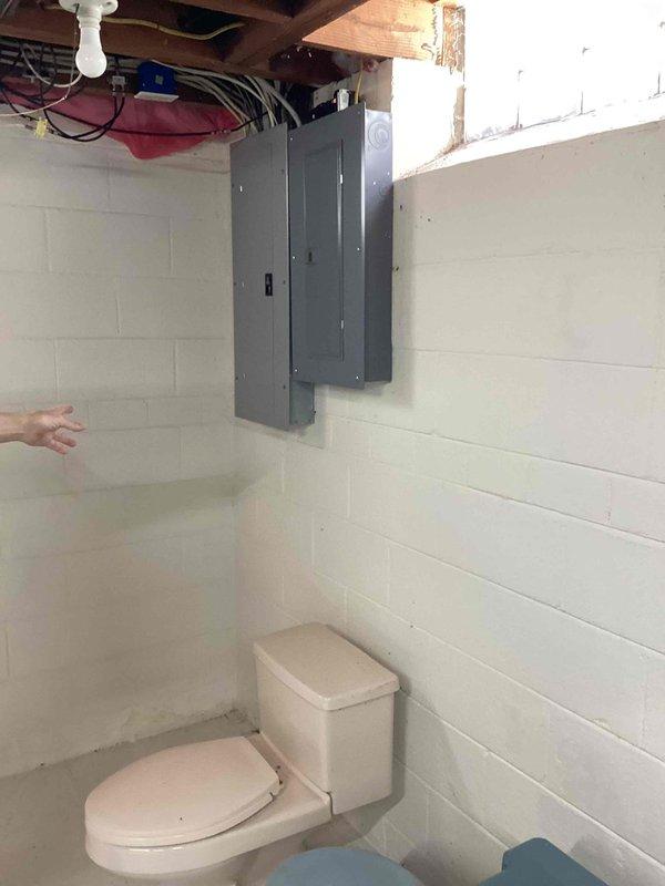 Completed electrical estimate for new whole home generator installation at manufactured home. Assessed existing electrical panel in basement, which currently contains three circuit breakers with available capacity for generator integration. Documented electrical infrastructure and panel configuration to determine proper sizing and installation requirements for whole home generator system.