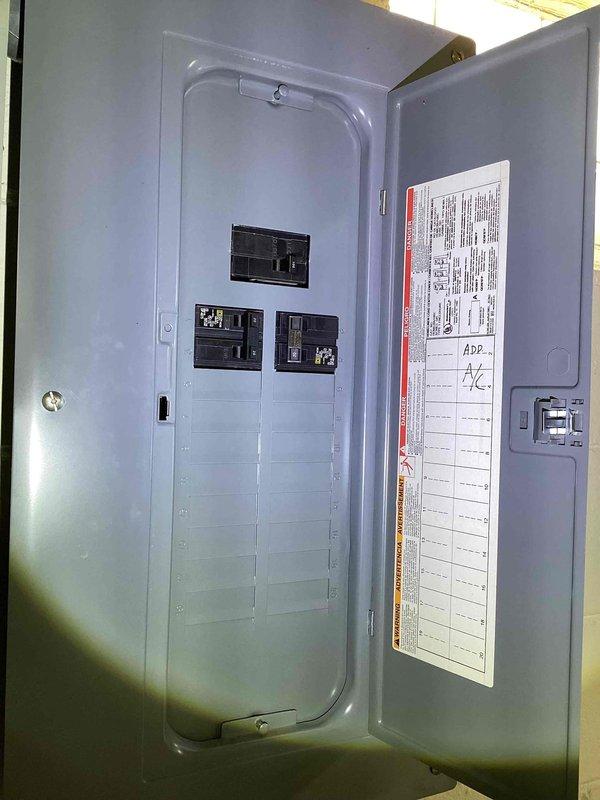 Completed electrical estimate for new whole home generator installation at manufactured home. Assessed existing electrical panel in basement, which currently contains three circuit breakers with available capacity for generator integration. Documented electrical infrastructure and panel configuration to determine proper sizing and installation requirements for whole home generator system.