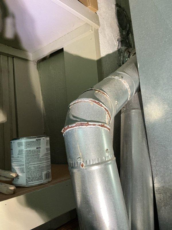 Completed comprehensive tune-up and safety inspection on 15-20 year old furnace located in first floor laundry room utility closet. Performed standard maintenance procedures including filter inspection, burner assembly examination, heat exchanger visual inspection, blower motor operation check, and thermostat calibration verification. Inspected ductwork connections and verified proper sealing at joints with existing mastic application. Documented equipment condition with photographic evidence for official city inspection report required for property licensing purposes. Unit operating within normal parameters with no immediate safety concerns identified at time of service.