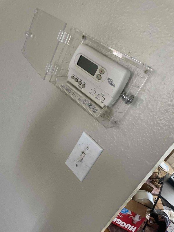 Provided comprehensive replacement estimate for non-operational HVAC system including air conditioning unit, natural gas furnace, and water heater, all located in basement. Assessed existing equipment configuration, evaluated current thermostat setup, and documented gas line infrastructure and basement mechanical room conditions to determine proper sizing and installation requirements for complete system replacement.