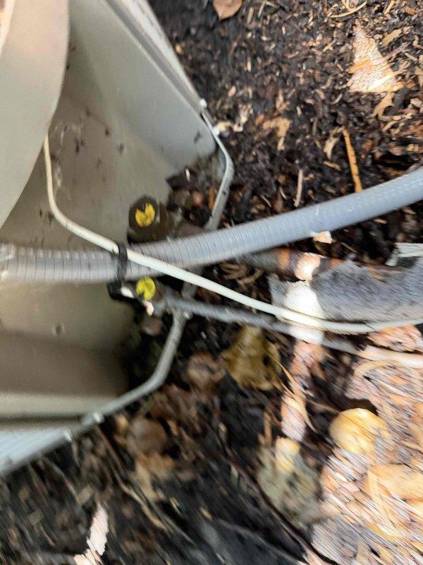Responded to no cooling complaint on 5-year-old air conditioning system located on second floor. Performed diagnostic inspection of outdoor condensing unit, which showed no visible external damage or refrigerant line issues. Unit exterior and components appeared in good operational condition with proper line connections secured, though indoor air handler assessment would be required to complete diagnosis and restore cooling function.