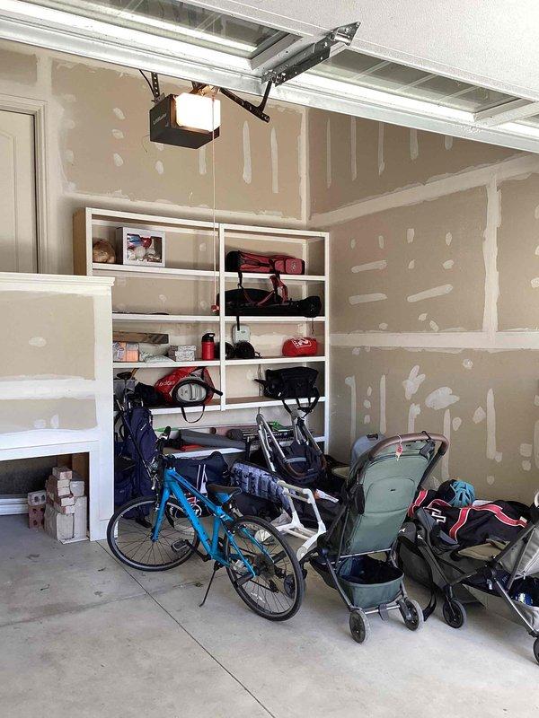 Conducted on-site evaluation for garage climate control system installation. Property currently utilizes boiler heating system for main residence. Assessed unfinished garage space with exposed drywall and determined equipment placement options and heating/cooling requirements for the detached or semi-finished area. Documented existing conditions including electrical access points, insulation status, and structural considerations for future HVAC equipment installation. Provided comprehensive estimate for climate control solutions suitable for garage conversion or workshop use.