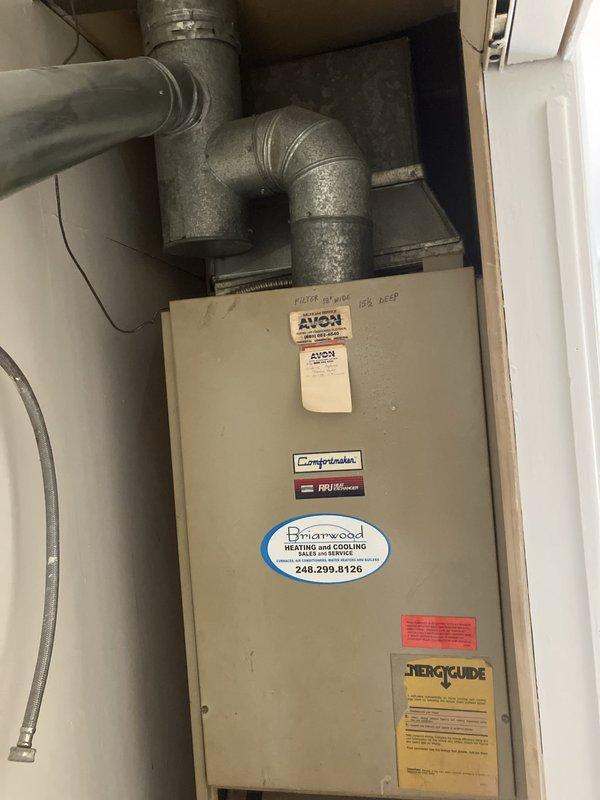 Responded to service call for loud noise from cooling system at residential property. Upon arrival, inspected 10+ year old Comfortmaker air handler unit located on first floor. System was operational and providing adequate cooling despite audible noise concern. Conducted visual inspection of unit and associated ductwork, documenting existing equipment configuration including Nest thermostat control and metallic duct connections. Provided comprehensive estimate for full HVAC system replacement to address aging equipment and operational concerns.