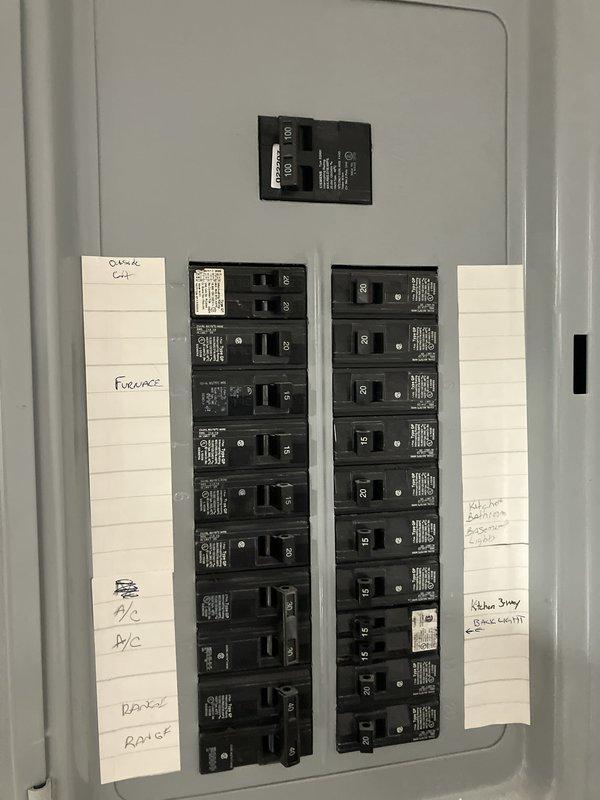 Responded to service call for cooling system concerns at residential property. Performed visual inspection of 10+ year old cooling equipment located in basement, which was found to be operational and producing cool air at time of visit. Documented electrical service panel and exterior meter installation with photographic records showing standard residential 120/240V distribution panel with properly labeled circuits and exterior utility metering equipment in serviceable condition.