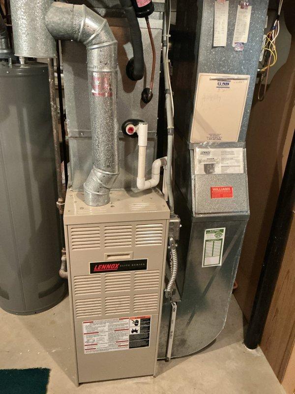 Responded to service call for thermostat replacement in living room due to poor display readability on one-month-old unit. Removed existing wall-mounted thermostat and installed new replacement unit with improved display visibility. Verified proper wiring connections, tested system operation through heating and cooling cycles, and confirmed accurate temperature readings and responsive control of HVAC equipment.