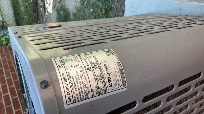 Responded to no cooling complaint on 4-year-old residential air conditioning system located in backyard. Upon arrival, performed diagnostic inspection of outdoor condensing unit and associated refrigerant lines. Verified electrical connections at disconnect box, inspected condenser coil condition, and checked refrigerant line insulation integrity. Unit appeared to be in normal operating condition with proper installation of PVC refrigerant lines and electrical components properly secured.