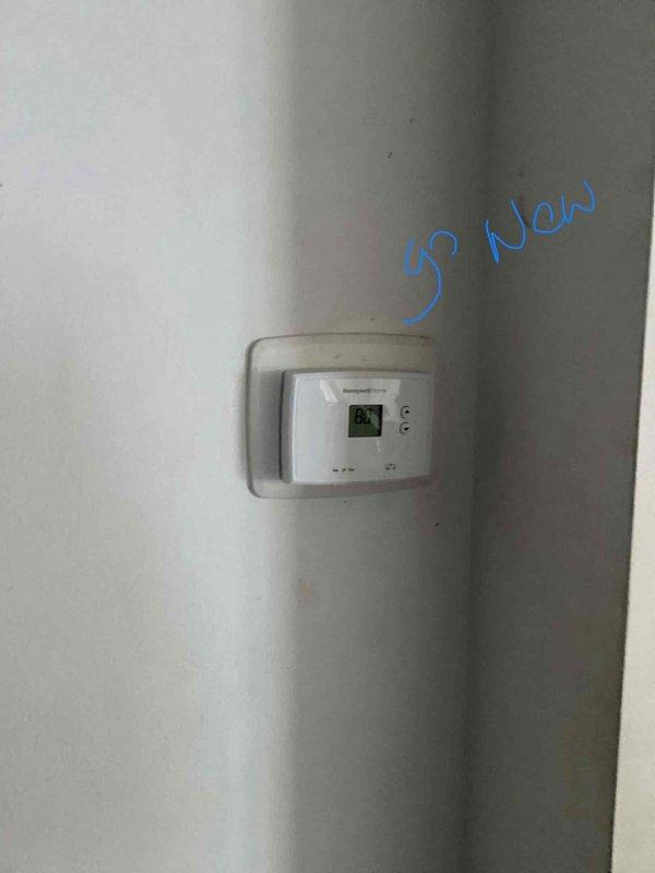 Completed full system estimate for 15-year-old HVAC system experiencing condensation issues in chimney during winter operation. Assessed existing chimney liner condition at rear right-hand side of building and documented current system functionality, noting heating capability remains intact despite moisture accumulation. Evaluated electrical panel, thermostat controls, and overall system configuration to provide comprehensive replacement recommendations addressing condensation concerns and aging equipment.