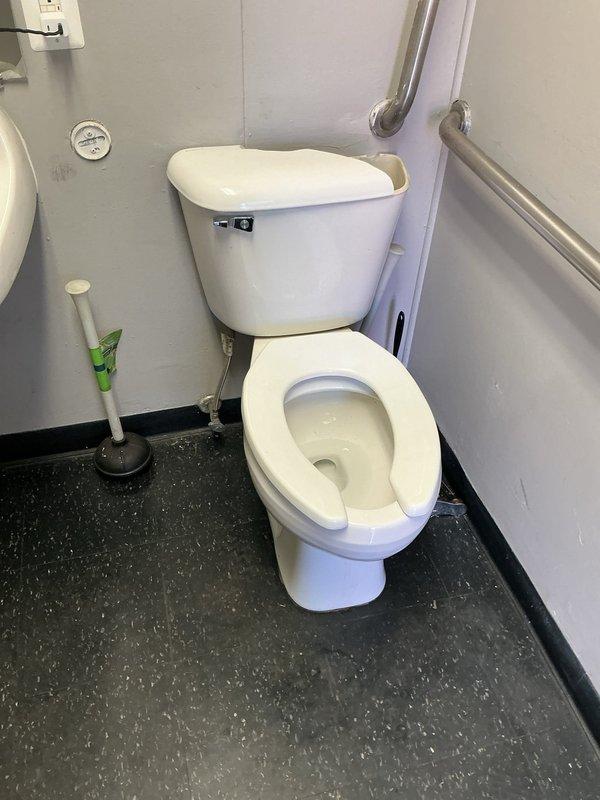 Completed installation of two Mansfield toilet tanks in a commercial accessible restroom facility. Both units were properly mounted, connected to water supply lines, and tested for proper operation and leak-free performance.