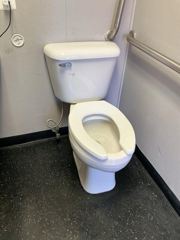 Completed installation of two Mansfield toilet tanks in a commercial accessible restroom facility. Both units were properly mounted, connected to water supply lines, and tested for proper operation and leak-free performance.