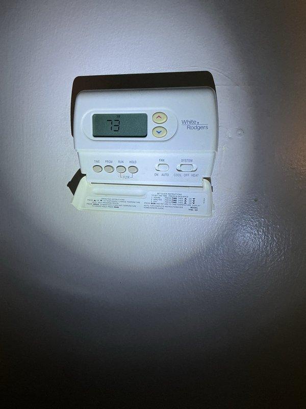 Completed comprehensive Gold AC Inspection on 4-year-old HVAC system with basement-located air handler. Performed multi-point inspection including visual assessment of furnace, ductwork connections, copper refrigerant lines, and air handler unit. Verified thermostat operation and temperature settings at 73 degrees, confirmed proper system functionality with all equipment operating as designed.