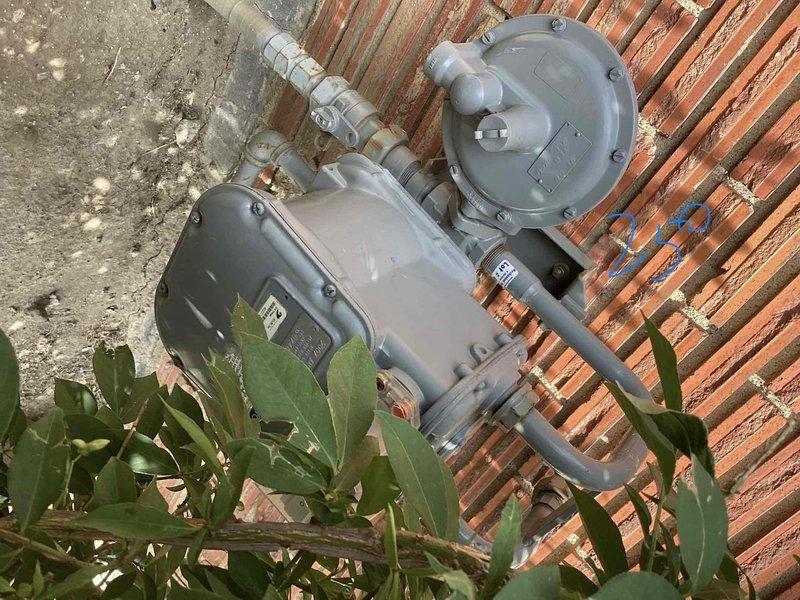 Conducted on-site assessment for new whole home generator installation at residential property. Documented generator placement specifications with unit to be installed at rear of home in parallel orientation, maintaining 8-foot clearance from side lot line in compliance with manufacturer requirements. Evaluated existing electrical panel, meter grade to drop measurements, and verified gas meter location and routing path from gas service to proposed generator location. Confirmed clearance requirements for air intake, exhaust positioning, and distances from windows and openings per installation standards.