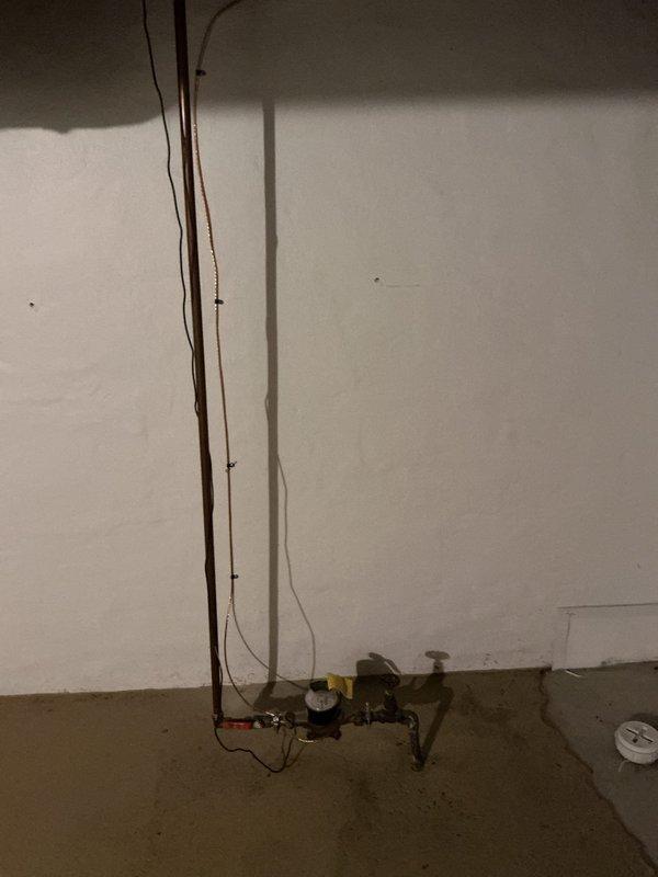 Completed 150-amp electrical service upgrade and panel installation. Installed new exterior meter base, weatherhead, and service entrance conductors on brick facade, along with proper grounding and conduit system. Ran new circuit wiring from exterior service entrance through interior utility space to new electrical panel, ensuring all connections meet current electrical code requirements.