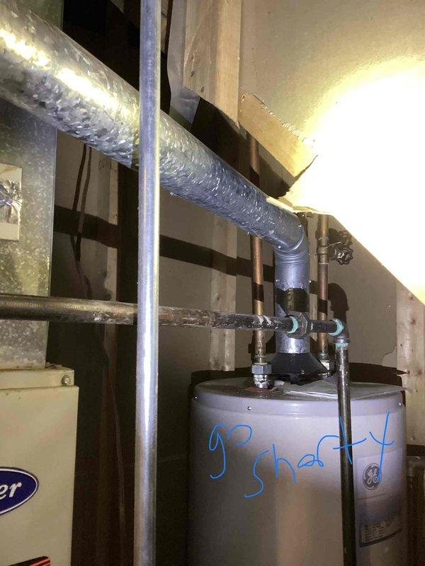 Responded to service call for non-operational air conditioning system affecting entire residence. Upon inspection, discovered 30-year-old furnace with cracked heat exchanger requiring immediate replacement due to safety concerns. Evaluated 30-year-old evaporator coil and 12-year-old condenser unit operating on R22 refrigerant, found system low on refrigerant charge. Assessed existing thermostat and determined replacement necessary for proper system operation. Provided comprehensive estimate for complete HVAC system replacement including new high-efficiency furnace, evaporator coil, condenser unit, and programmable thermostat. Presented optional APCO air purification system to address indoor air quality concerns. Documented equipment conditions with photographs of existing thermostat location and mechanical room configuration showing water heater, ductwork, and HVAC components. Reviewed all replacement options and recommendations with homeowner for full system upgrade.