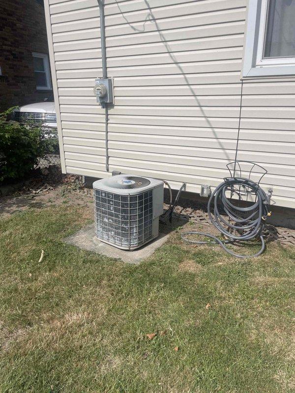 Completed full HVAC system estimate for residential property requiring replacement of both air conditioning unit and furnace system located in basement. Assessed existing equipment condition, measured installation space in basement and crawl space areas, verified electrical service capacity at exterior meter, and evaluated refrigerant line routing through structural framing. Documented outdoor condensing unit placement on concrete pad, confirmed adequate clearances for new equipment installation, and photographed existing ductwork configuration and utility connections to provide comprehensive replacement specifications for complete heating and cooling system upgrade.