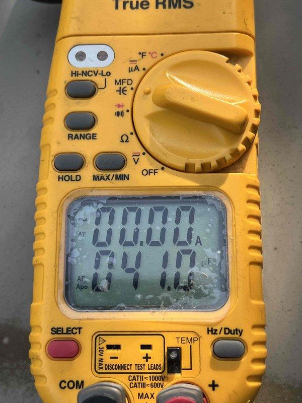 Completed comprehensive Gold AC inspection on 18-year-old single-unit air conditioning system with basement-located air handler. System was operational upon arrival. Performed full electrical diagnostics using True RMS digital multimeter and clamp meter to verify voltage, amperage, and capacitor functionality. Measured electrical components including capacitor performance and circuit integrity. All readings documented and photographed for service records. Unit confirmed to be functioning within acceptable parameters at time of inspection.
