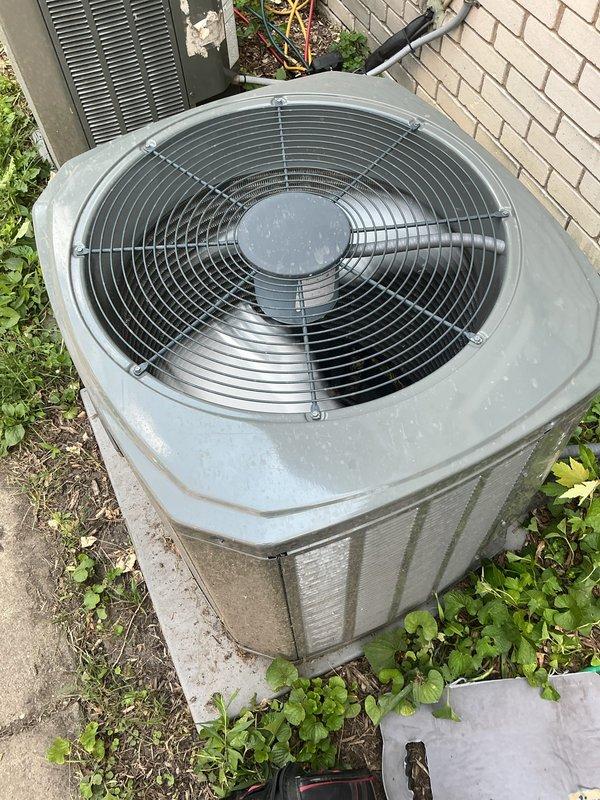 # HVAC Maintenance - Gold AC Inspection

Performed comprehensive annual maintenance on two 4-year-old outdoor air conditioning condenser units. Conducted thorough inspection of both systems including visual assessment of condenser housings, fan assemblies, and protective grilles. Verified proper mounting and levelness of units on concrete foundation pads.

Inspected electrical connections and junction boxes for both condensers. Checked refrigerant lines and copper tubing connections for signs of wear, corrosion, or leakage. Examined louvered side panels and air intake/exhaust pathways for obstructions or debris accumulation.

Tested fan operation and motor performance on both units. Verified proper airflow through condenser coils and protective wire guards. Inspected circular fan grilles and radial support structures for integrity and secure mounting.

Assessed overall condition of condenser housings, noting minor surface weathering consistent with normal outdoor exposure for 4-year-ol
