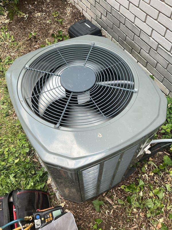 # HVAC Maintenance - Gold AC Inspection

Performed comprehensive annual maintenance on two 4-year-old outdoor air conditioning condenser units. Conducted thorough inspection of both systems including visual assessment of condenser housings, fan assemblies, and protective grilles. Verified proper mounting and levelness of units on concrete foundation pads.

Inspected electrical connections and junction boxes for both condensers. Checked refrigerant lines and copper tubing connections for signs of wear, corrosion, or leakage. Examined louvered side panels and air intake/exhaust pathways for obstructions or debris accumulation.

Tested fan operation and motor performance on both units. Verified proper airflow through condenser coils and protective wire guards. Inspected circular fan grilles and radial support structures for integrity and secure mounting.

Assessed overall condition of condenser housings, noting minor surface weathering consistent with normal outdoor exposure for 4-year-ol