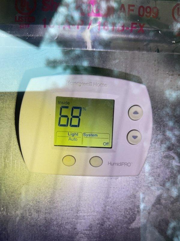 Completed comprehensive gold-level preventive maintenance inspection on recently installed Lennox air conditioning system. Unit had not yet been activated for the season. Performed full system evaluation including exterior condenser inspection, verified proper installation on rubber isolation pad with adequate drainage, confirmed electrical connections, and assessed Honeywell HumidiPRO thermostat operation currently set to system off mode at 68 degrees. All components found in excellent condition with no deficiencies noted on this new installation.