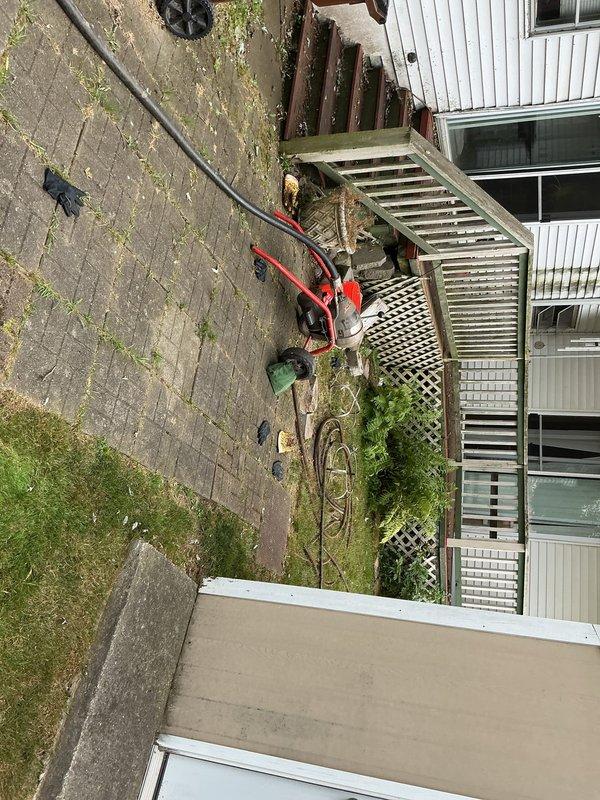 Responded to service call for clogged 4-inch PVC drain stack at mobile home property. Successfully snaked the exterior drainage line running from the structure out into the yard to clear blockage and restore proper flow. Access was gained through exterior cleanout, and mechanical auger was deployed to remove obstruction from the main waste line. System tested and confirmed operational upon completion.