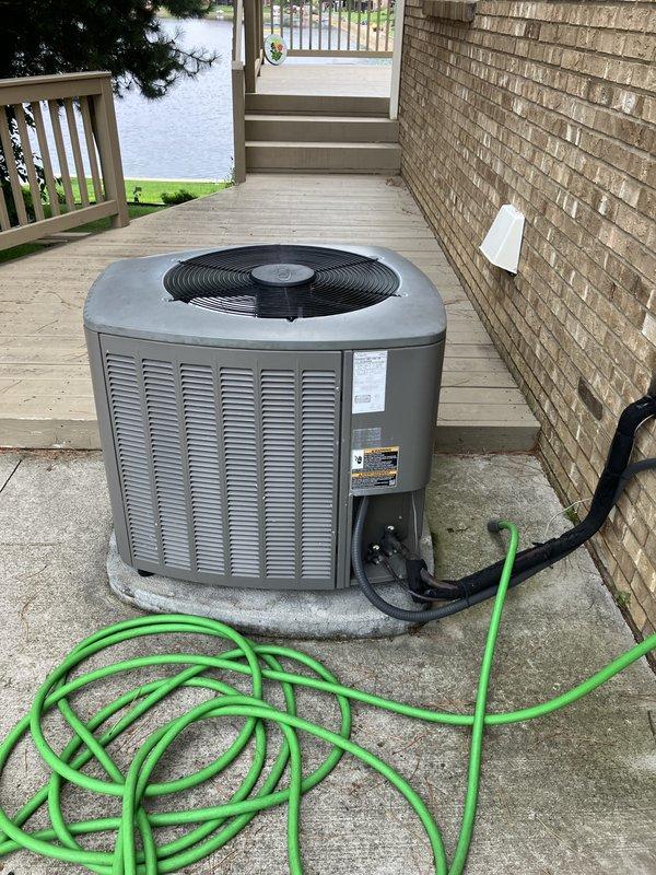 Performed comprehensive evaluation of residential Lennox air conditioning system experiencing refrigerant leak in evaporator coil. Conducted thorough leak search diagnostics and documented existing outdoor condensing unit condition. Provided estimate for complete system replacement due to leaking coil requiring repair beyond economical service threshold.
