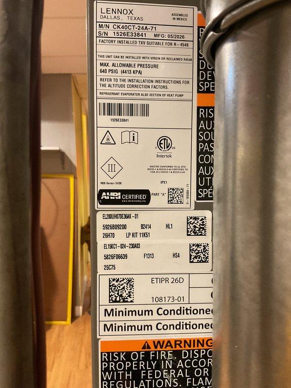 Completed full HVAC system installation in residential basement including a Lennox 70,000 BTU gas furnace (Model CK40CT-24A-7T) and 2-ton air conditioning unit with rear discharge configuration. Installation included proper ductwork connections, PVC venting and condensate drainage piping, electrical disconnects, and unit placement on protective base pad per manufacturer specifications. Mechanical and electrical permits were coordinated for this complete system replacement, with electrical reconnection work requiring licensed electrician to finalize power connections.