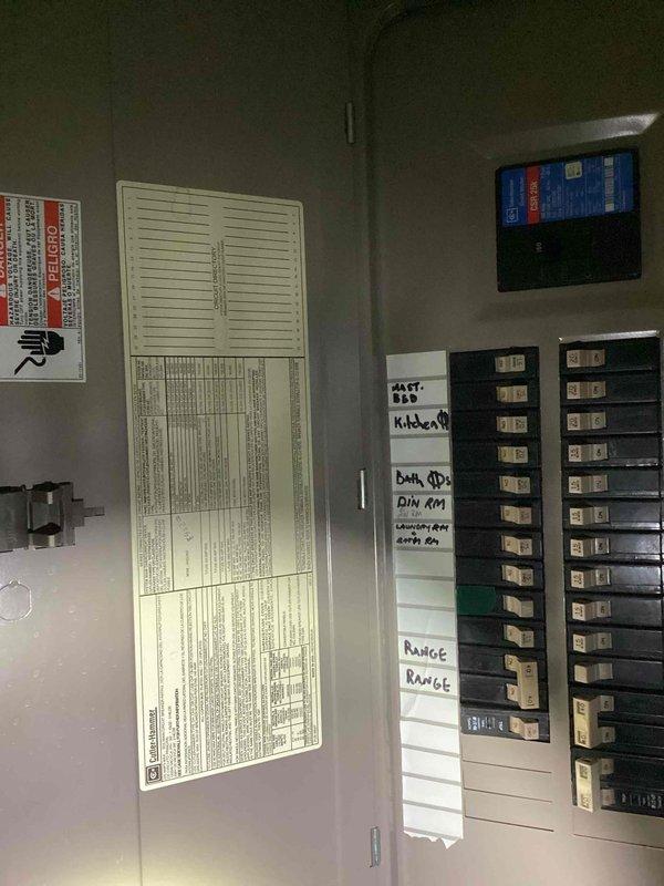 Completed electrical estimate for new whole home generator installation at manufactured home. Assessed existing electrical panel configuration, circuit breaker capacity, and available utility space in basement area to determine optimal generator placement and integration requirements. Documented current electrical infrastructure including panel layout, available circuits serving kitchen, dining room, and range, along with basement utility area conditions to develop comprehensive installation plan and equipment specifications.