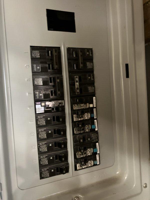 Conducted on-site assessment for air conditioning unit replacement. Evaluated existing HVAC system installation located in mechanical space, including air handler unit with associated ductwork and electrical connections. Inspected electrical panel to verify circuit breaker capacity and available power supply for potential new equipment installation. Documented current system configuration, including insulated supply ductwork, PVC condensate drain lines, and flexible return air connections. Photographed electrical infrastructure and existing HVAC components to provide accurate equipment specifications and installation requirements for replacement estimate.